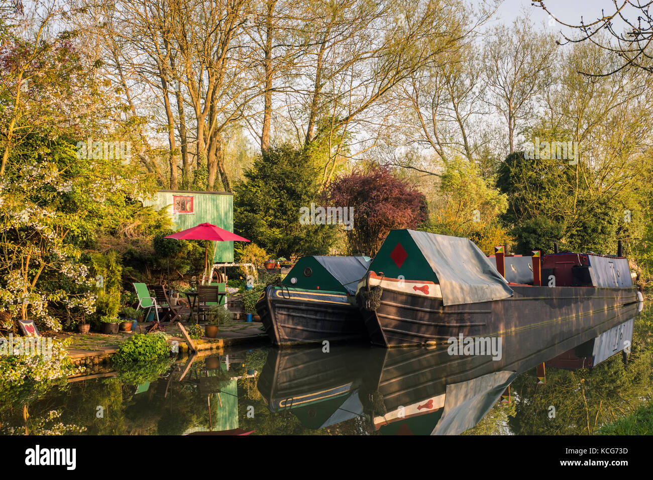 Canal boating Oxford Canal Oxfordshire England early morning reflections Stock Photo