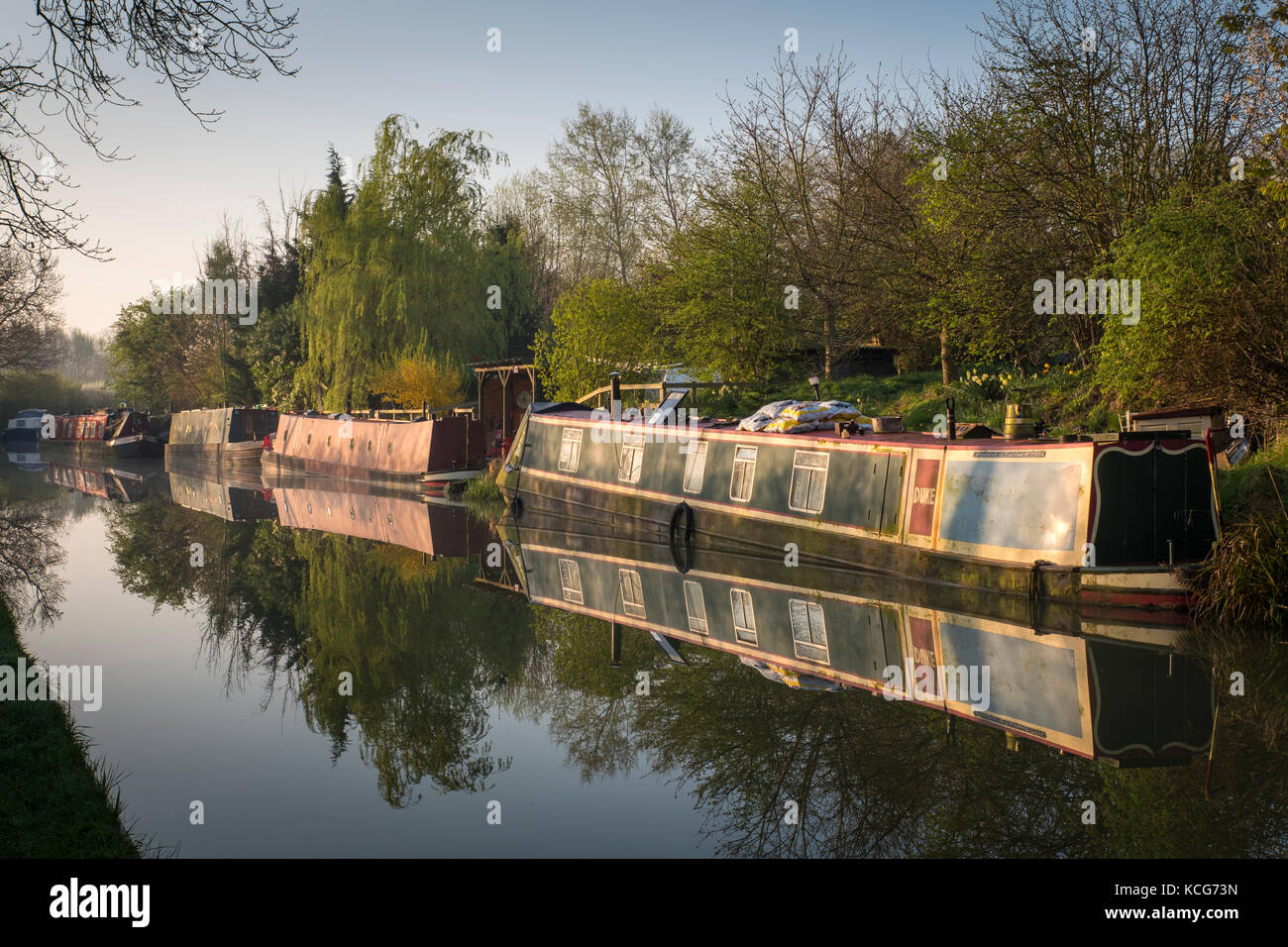 Canal boating Oxford Canal Oxfordshire England early morning reflections Stock Photo