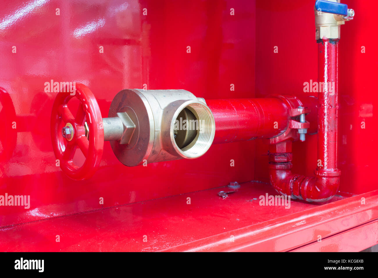 Fire hose cabinet installed in the building Stock Photo