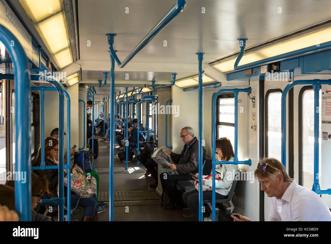 Regional train with commuters bound for Ostia Antica site, Rome, Italy ...