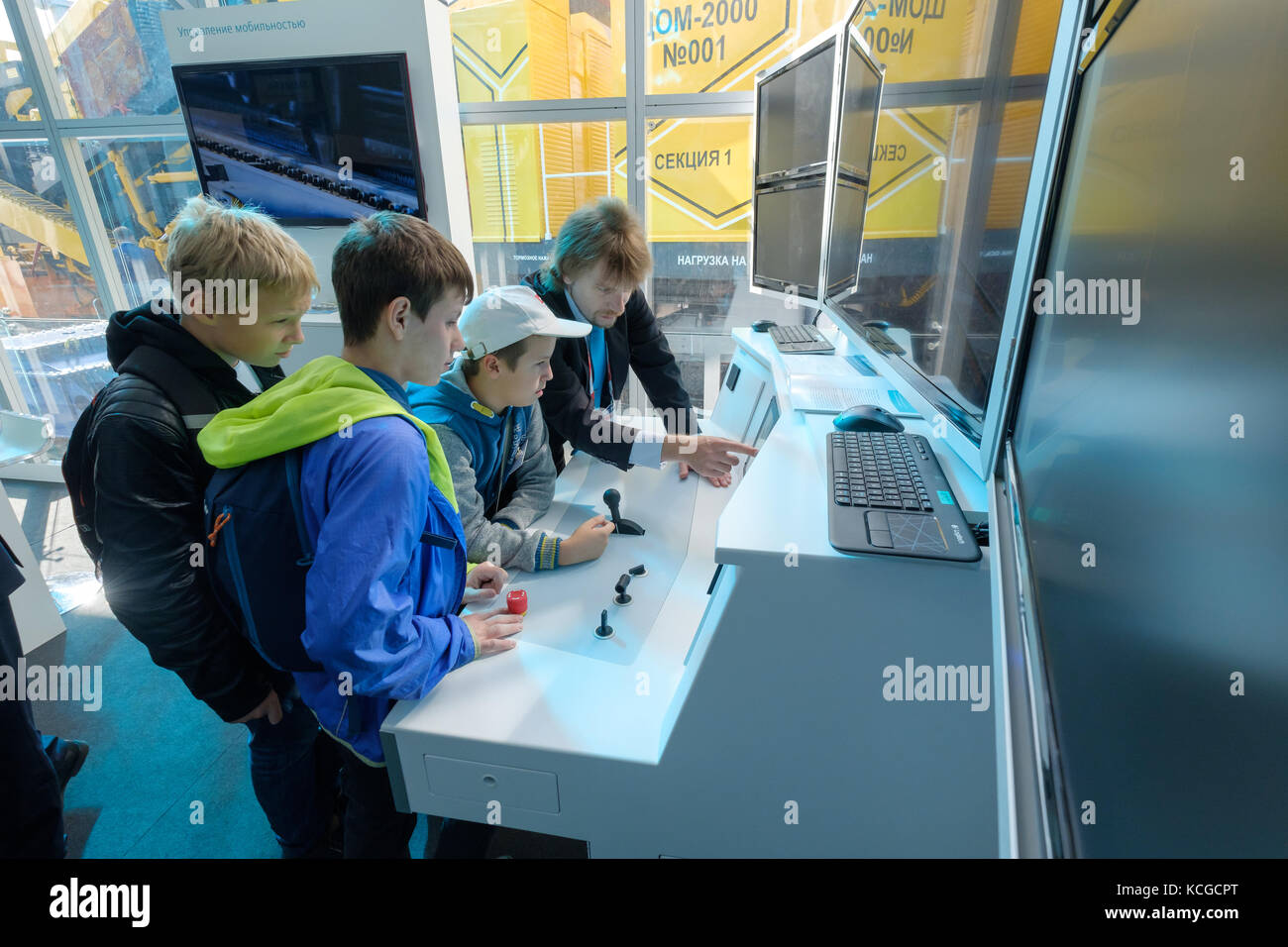 Children study the train driving simulator Stock Photo Alamy
