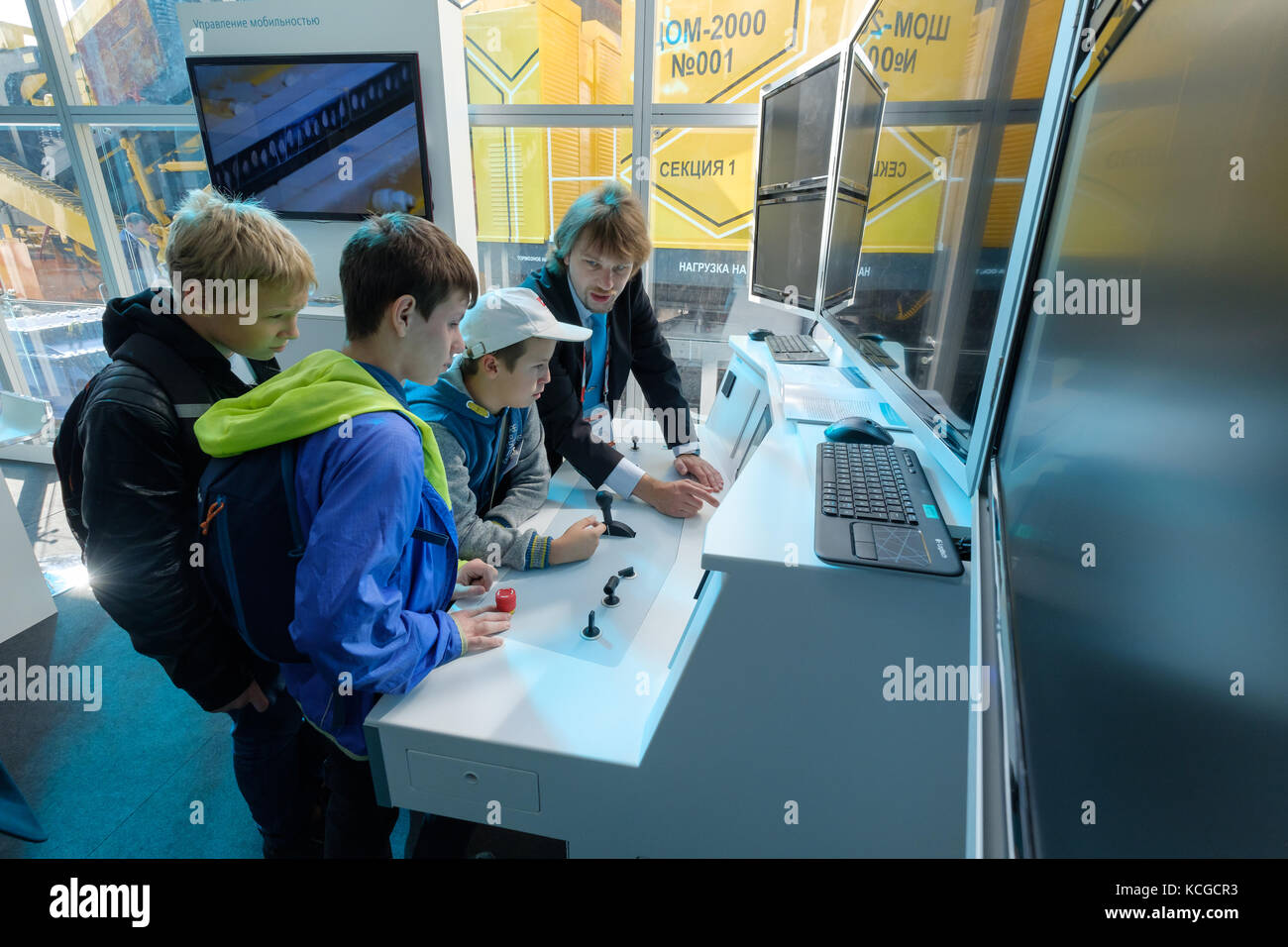 Children study the train driving simulator Stock Photo Alamy
