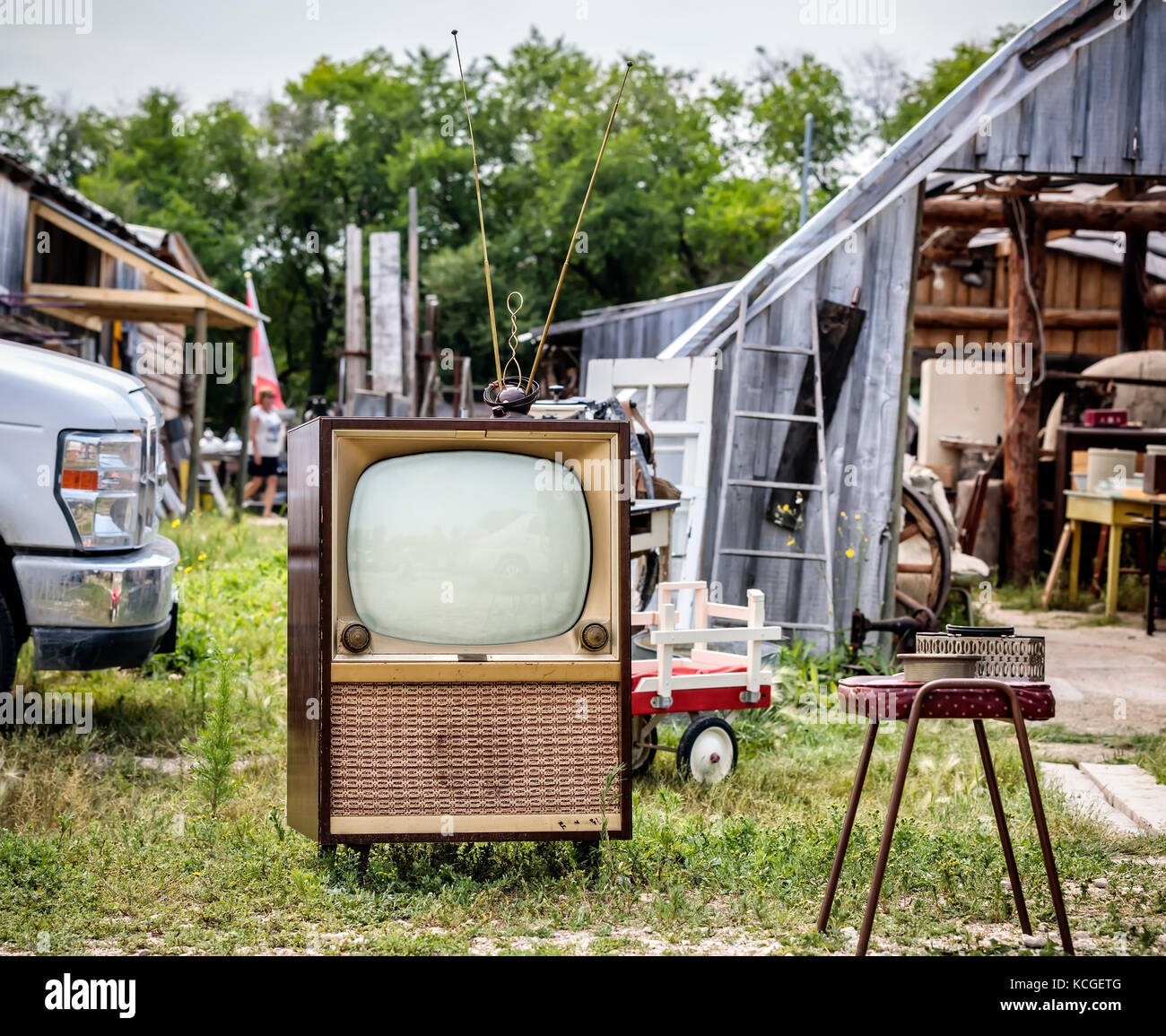 A vintage television and other items at an outdoor Flea Market, Manitoba, Canada. Stock Photo