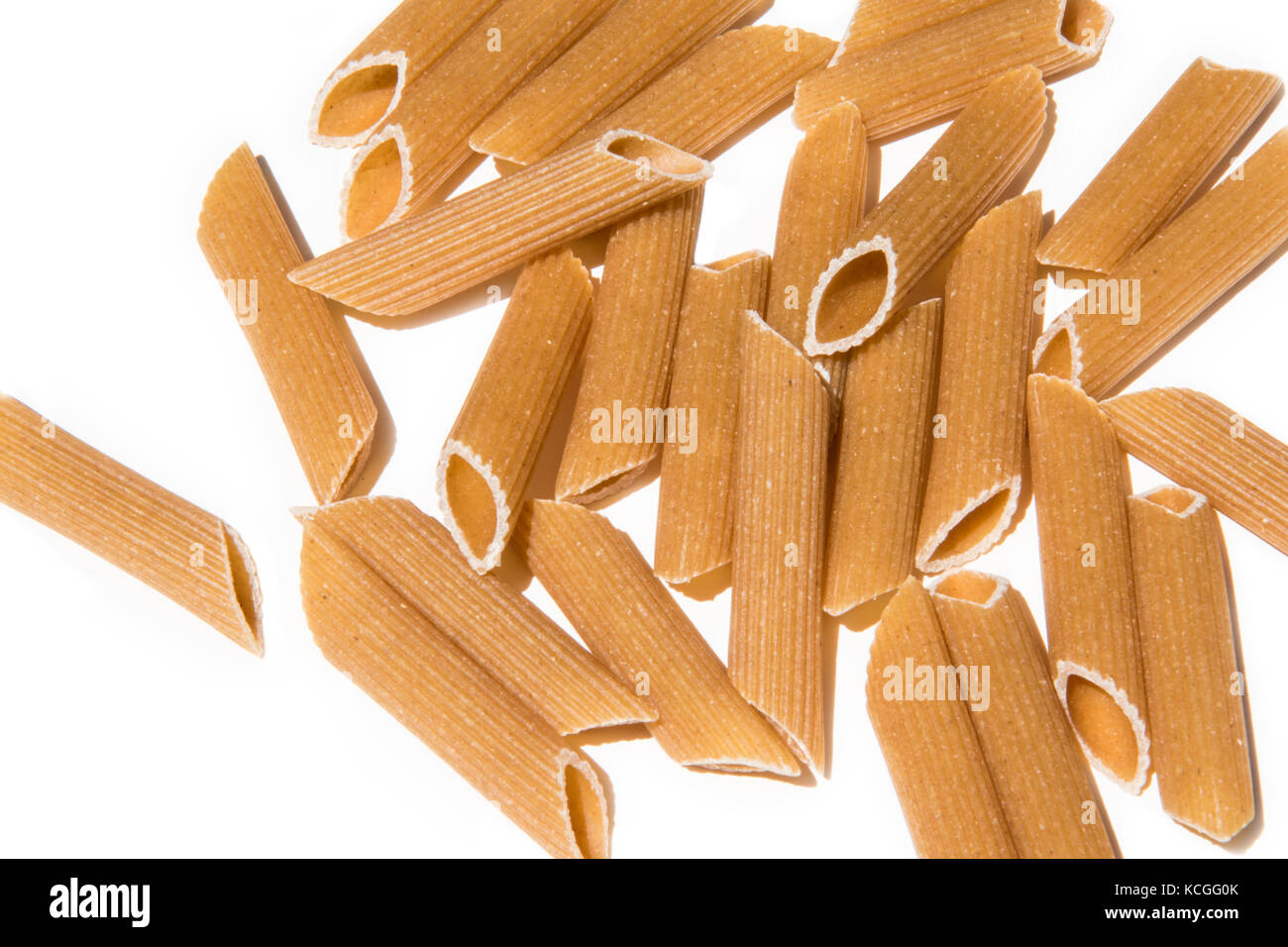 penne pasta isolated on white background Stock Photo - Alamy