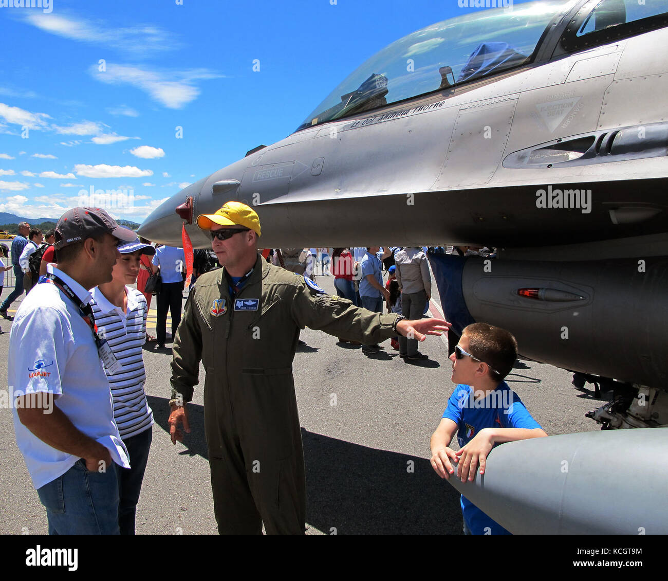 U.S. Air Force Lt. Col. Andrew Thorne, an F-16 pilot with the South Carolina Air National Guard’s 169th Fighter Wing speaks to visitors during the Colombian Air Force’s Feria Aeronautica Internaccional – Colombia in Rionegro, Colombia, July 13, 2017. The United States Air Force is participating in the four-day air show with two South Carolina Air National Guard F-16s as static displays, plus static displays of a KC-135, KC-10, along with an aerial demonstration by the Air Combat Command’s Viper East Demo Team and a B-52 flyover. The United States military participation in the air show provides Stock Photo
