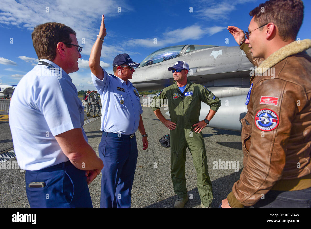 U.S. Air Force Col. Nicholas Gentile, the 169th Fighter Wing Commander, left, and Lt. Col Jeff Beckham, a fighter pilot assigned to the 157th Fighter Squadron right, speak with Gen. Carlos Bueno, the Chief of the Colombian Air Force, center, at José María Córdova International Airport during F-AIR 2017 in Rionegro, Colombia, July 13, 2017. United States military participation in the air show provides an opportunity to strengthen our military-to-military relationships with regional partners and provides the opportunity to meet with our Colombian air force counterparts and facilitate interoperab Stock Photo