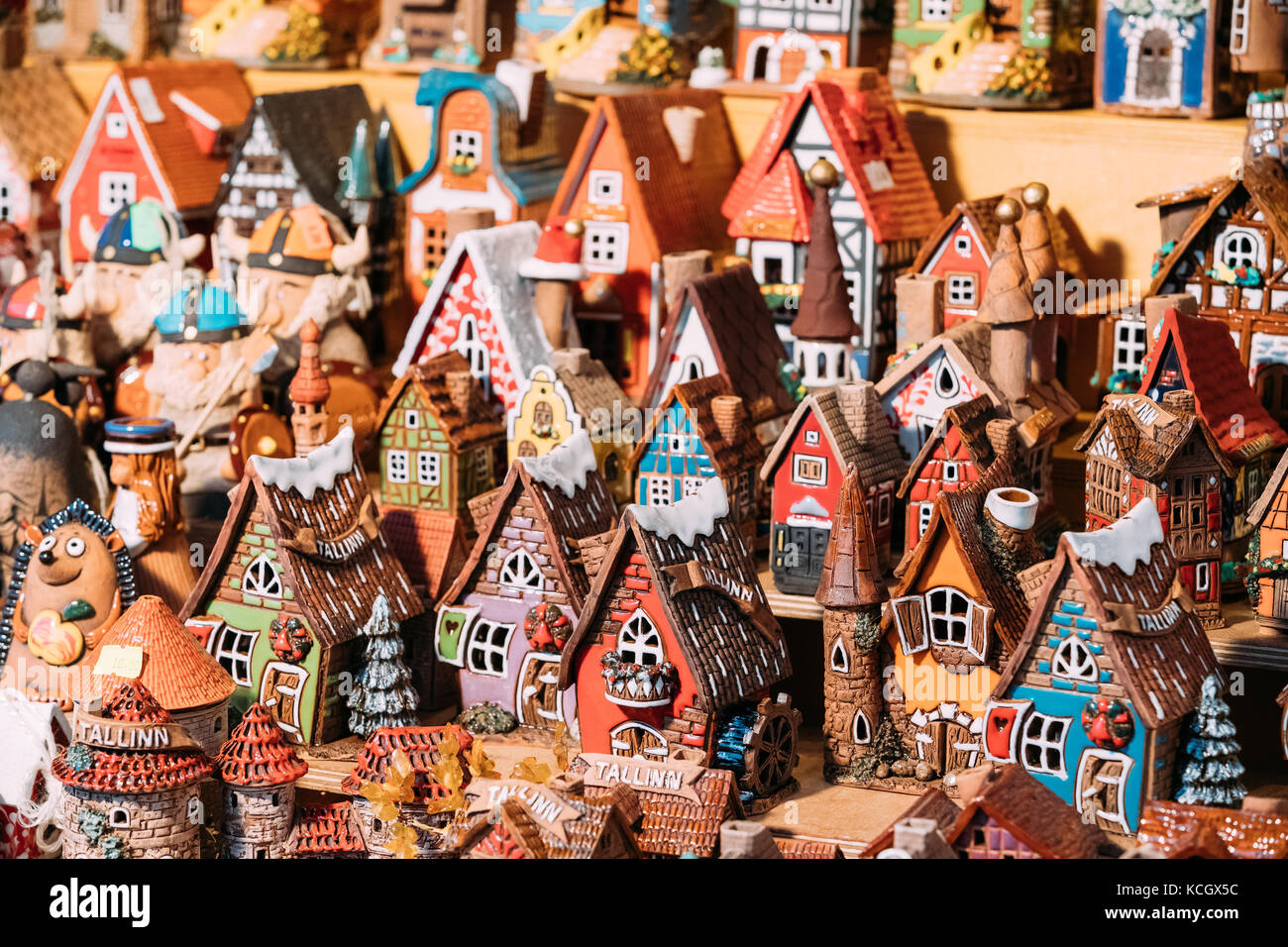Traditional Souvenirs Small House Toys At European Market. Funny Souvenir From Tallinn, Estonia, Europe. Stock Photo