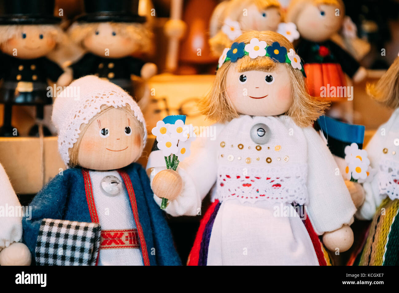 Traditional Souvenirs Ethnic Folk National Wooden Dolls Toys At European Estonian Market. Popular Souvenir From Tallinn, Estonia Stock Photo