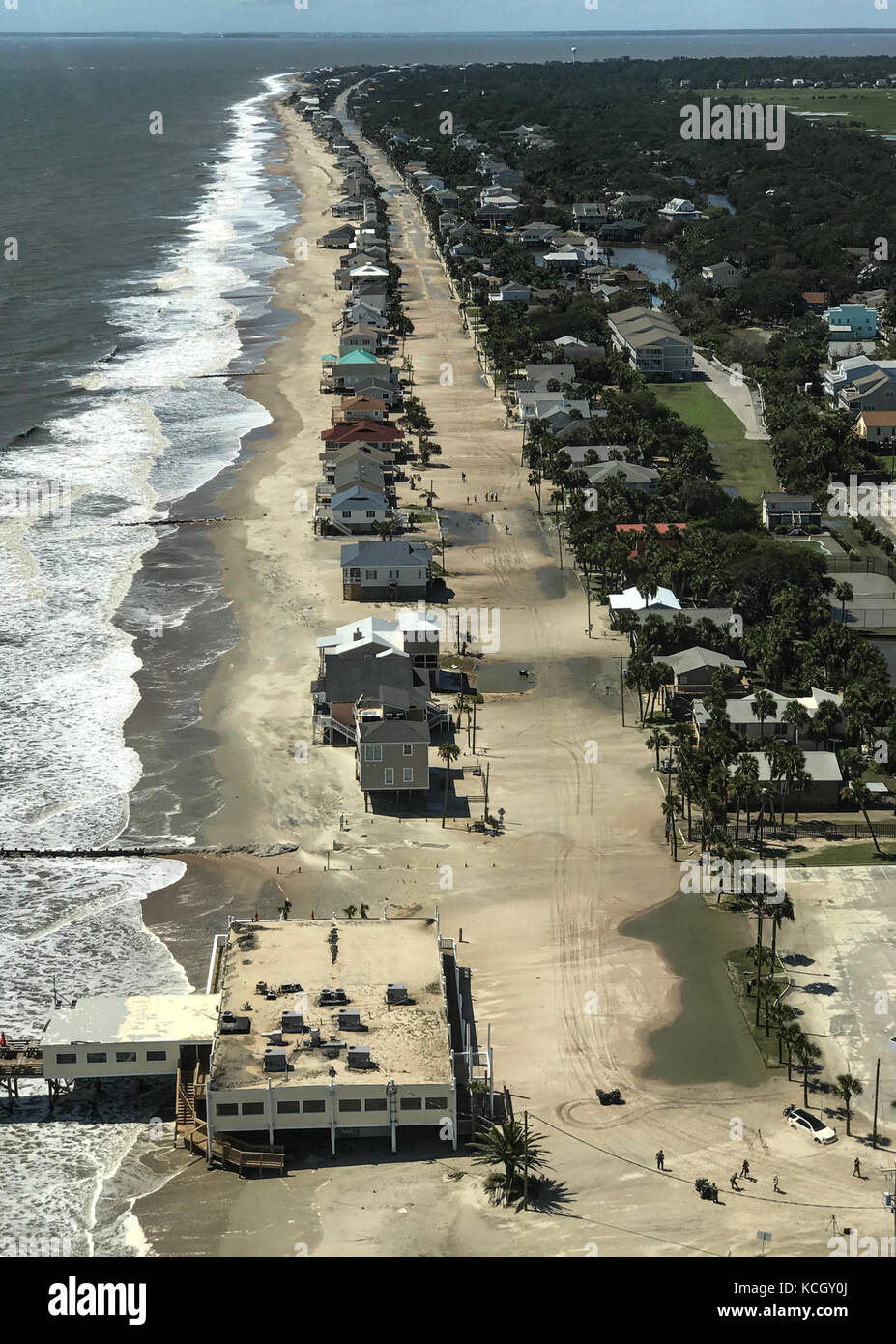 A South Carolina Army National Guard LUH-72A Lakota utility helicopter assigned to the “Raiders” of A Co., 2-151st Security and Support Aviation Battalion, flies over Edisto Island in the aftermath of Hurricane Irma continental landfall, South Carolina, September 12, 2017. The flight was part of a larger damage-assessment mission flown by the National Guard crew in support of the S.C. Department of Transportation. The LUH-72A is a multi-mission, military, aircraft providing flexible response capabilities to Homeland Security and local authorities during emergencies. The helicopter can perform  Stock Photo