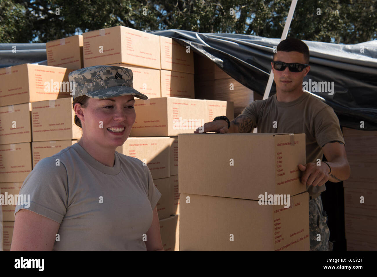 U.S. Soldiers from C Company, 1-118th Infantry, 218th Maneuver Enhancement Brigade, South Carolina Army National Guard distributed food and water in Hillsborough County, FL Sept. 15, 2017. The Soldiers are in Florida providing support during the recovery efforts after Hurricane Irma came ashore and devastated the state.  (U.S. Army National Guard Photo by Staff Sgt. Erica Knight, 108th Public Affairs Detachment) Stock Photo