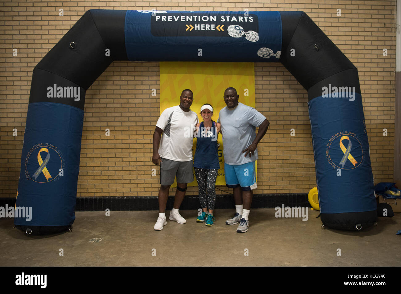 U.S. Soldiers with the South Carolina National Guard and civilians gather to participate in the annual Suicide Prevention Month 5k run/walk at the Carolina Gamecock Park, Columbia, South Carolina, September 22, 2017. The South Carolina National Guard Suicide Prevention Program sponsors this run to bring awareness and offers tools to better educate people who may have been affected by suicide. (U.S. Army National Guard photo by Spc. Chelsea Baker) Stock Photo