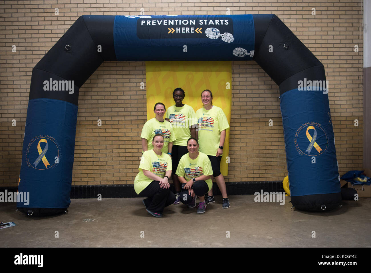 U.S. Soldiers with the South Carolina National Guard and civilians gather to participate in the annual Suicide Prevention Month 5k run/walk at the Carolina Gamecock Park, Columbia, South Carolina, September 22, 2017. The South Carolina National Guard Suicide Prevention Program sponsors this run to bring awareness and offers tools to better educate people who may have been affected by suicide. (U.S. Army National Guard photo by Spc. Chelsea Baker) Stock Photo