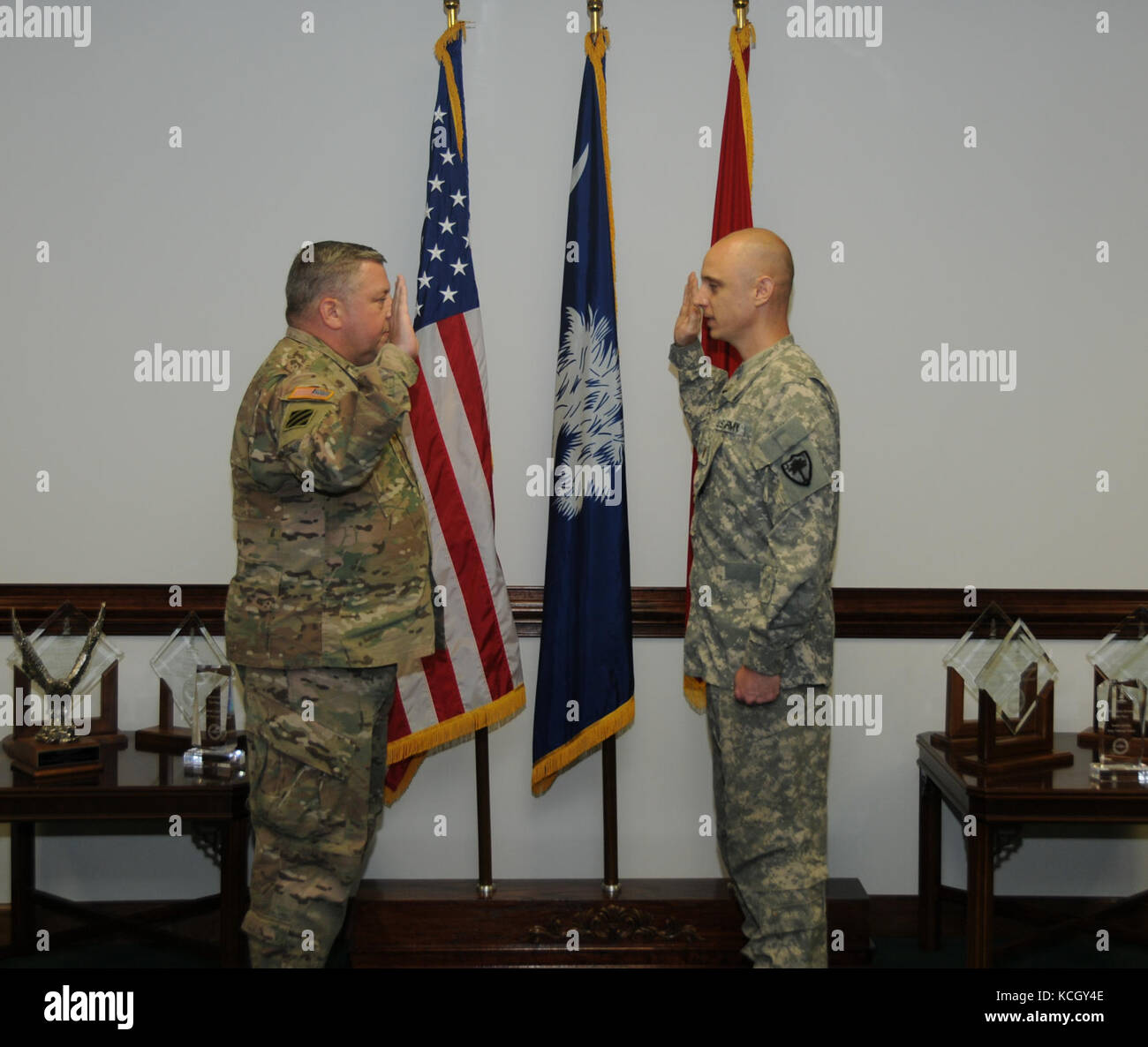 Two South Carolina Army National Guard Soldiers are commissioned as second lieutenants joining three more South Carolina Army National Guard officers in being recognized as the newest members of the Chaplain Corps. at the Adjutant General’s building in Columbia, South Carolina on September 22, 2017. (U.S. Army National Guard photo by 1st Lt. Cody I. Denson) Stock Photo