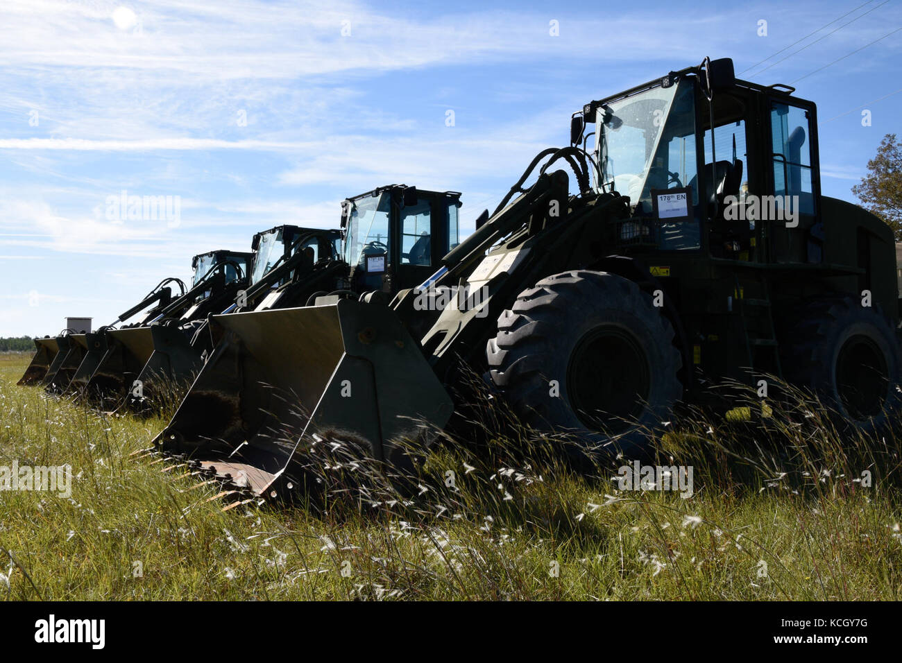 U.S. Soldiers assigned to the 178th Engineer Battalion, South Carolina Army National Guard, stage heavy equipment for transport to Puerto Rico at McEntire Joint National Guard Base. S.C. Oct. 1, 2017.  Engineers from South Carolina are being sent to help Puerto Rico with recovery efforts after Hurricane Maria devastated the island.  (U.S. Army National Guard 1st Lt. Tracci Dorgan) Stock Photo