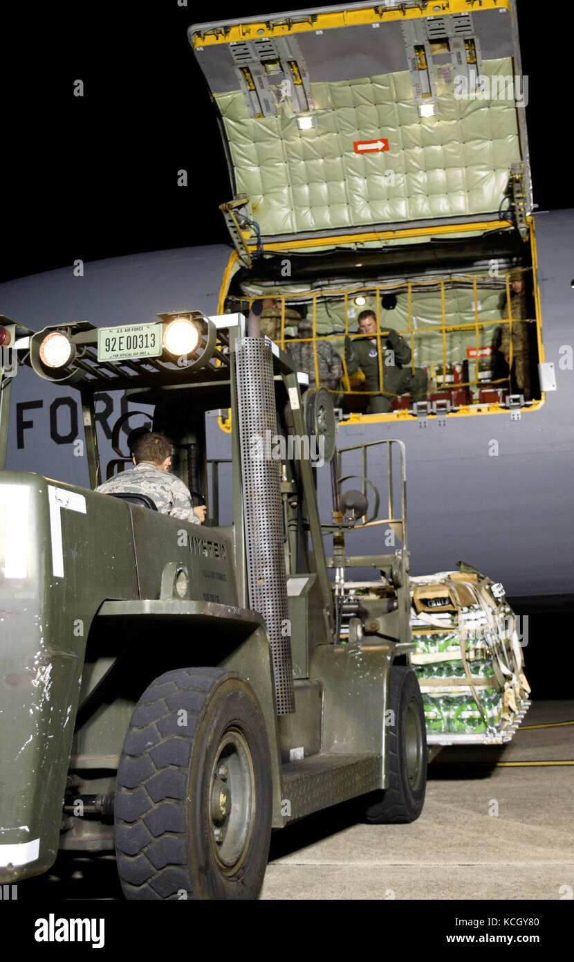 U.S. National Guard Soldiers from the South Carolina National Guard's 122nd and 178th Engineer Battalions depart McEntire Joint National Guard Base aboard a KC-135 Stratotanker from the 127th Air Refueling Group, Selfridge Air National Guard Base, Mich. to  provide Hurricane Maria relief support to Puerto Rico, Oct. 1, 2017. Over the next 24 hours, approximately 150 South Carolina National Guard Soldiers will deploy in three groups of personnel with support equipment. The 122nd is from Edgefield, S.C. and the 178th is based from Rock Hill, S.C. (U.S. Army photo by 1st Lt. Tracci Dorgan) Stock Photo