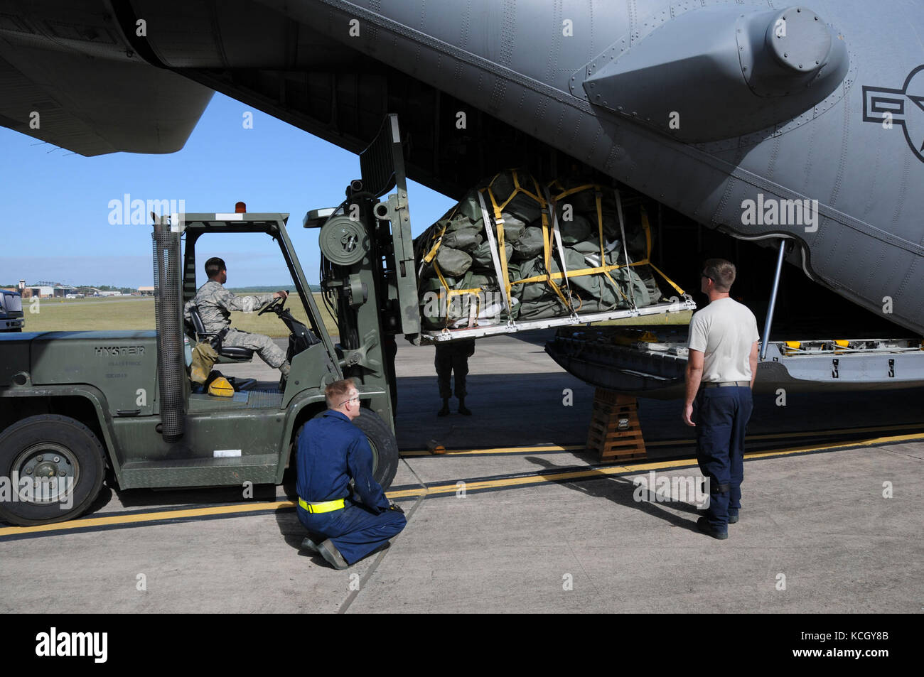 U.S. National Guard Soldiers from the South Carolina National Guard's 122nd and 178th Engineer Battalions depart McEntire Joint National Guard Base aboard a C-130 from 165th Airlift Wing, Savannah Georgia to provide Hurricane Maria relief support to Puerto Rico, Oct. 2, 2017. The 122nd is from Edgefield, S.C. and the 178th is based from Rock Hill, S.C. (U.S. Army photo by 1st Lt. Cody I. Denson) Stock Photo