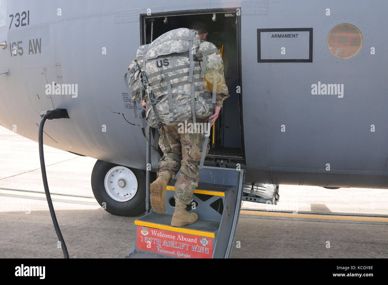 U.S. National Guard Soldiers from the South Carolina National Guard's 122nd and 178th Engineer Battalions depart McEntire Joint National Guard Base aboard a C-130 from 165th Airlift Wing, Savannah Georgia to provide Hurricane Maria relief support to Puerto Rico, Oct. 2, 2017. The 122nd is from Edgefield, S.C. and the 178th is based from Rock Hill, S.C. (U.S. Army photo by 1st Lt. Cody I. Denson) Stock Photo