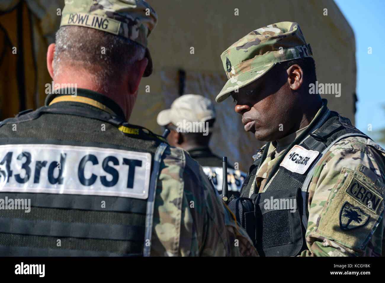 U.S. Soldiers and Airmen assigned to the 43rd Civil Support Team, South Carolina National Guard, train on their techniques in assessing how to deal with a suspicious package, at the Columbia Metro Airport, West Columbia, S.C., Oct., 3, 2017. The training exercise was in preparation for an upcoming national level inspection as well as to hone their skills in advising, assisting, assessing and identify any hazards for federal, state and local incident commanders. (U.S. Air National Guard photo by Jorge Intriago) Stock Photo