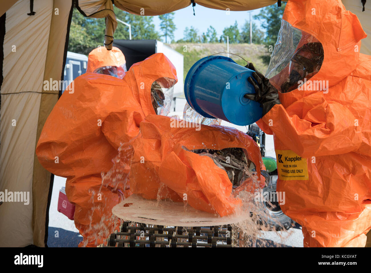 U.S. Soldiers and Airmen assigned to the 43rd Civil Support Team, South Carolina National Guard, set up their decontamination site and train on their techniques in assessing how to deal with a suspicious package, at the Columbia Metro Airport, West Columbia, S.C., Oct., 3, 2017. The training exercise was in preparation for an upcoming national level inspection as well as to hone their skills in advising, assisting, assessing and identify any hazards for federal, state and local incident commanders. (U.S. Army National Guard photo by Spc. Chelsea Baker) Stock Photo