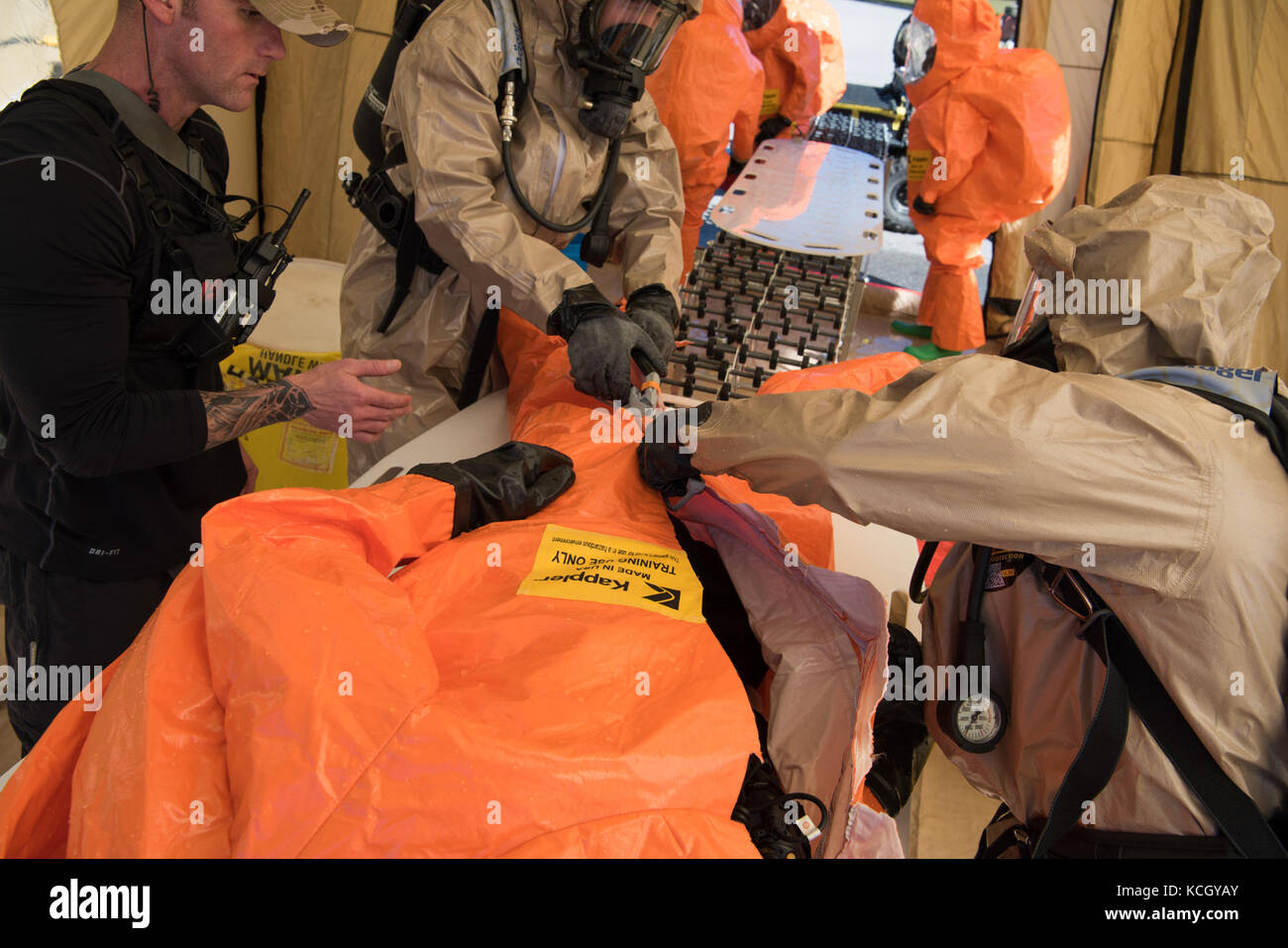 U.S. Soldiers and Airmen assigned to the 43rd Civil Support Team, South Carolina National Guard, set up their decontamination site and train on their techniques in assessing how to deal with a suspicious package, at the Columbia Metro Airport, West Columbia, S.C., Oct., 3, 2017. The training exercise was in preparation for an upcoming national level inspection as well as to hone their skills in advising, assisting, assessing and identify any hazards for federal, state and local incident commanders. (U.S. Army National Guard photo by Spc. Chelsea Baker) Stock Photo