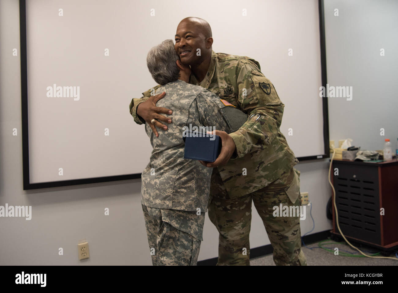 U.S. Army Sgt. 1st Class Kelsie Temples is honored on the day of her retirement at a ceremony held at the TAG complex in Columbia, South Carolina, October 3, 2017. Temples was a member of the Women's Army Corps (WAC) when she enlisted in 1976 and served 4 years active duty Army and 17 years South Carolina Army National Guard in multiple assignments, including Finance Non Commissioned Officer for the Joint Force Headquarters Fiscal Accounting Section as well as a Military Pay Clerk for the Headquarters State Area Command. (U.S. Army National Guard photo by Spc. Chelsea Baker) Stock Photo
