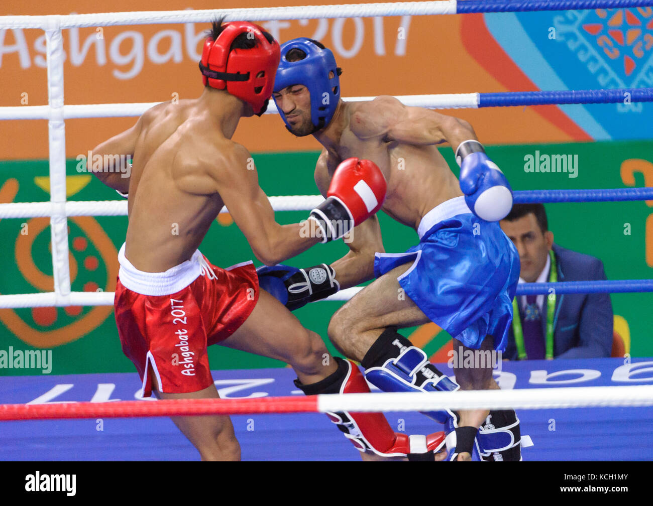 Ashgabat 2017 - 5th Asian Indoor & MartialArts Games 24-09-2017. Kickboxing - Tianhao Feng (CHN) v Dawran Rajabi (AFG) - Mens LK 63.5Kg division Stock Photo