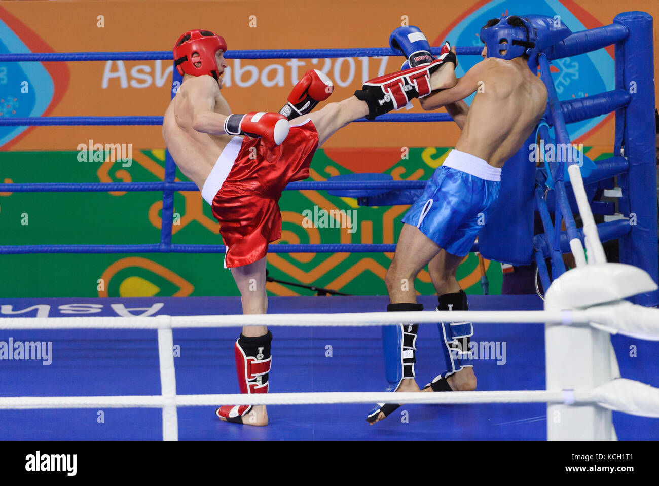 Ashgabat 2017 - 5th Asian Indoor & MartialArts Games 24-09-2017. Kickboxing - Chingiskhan Tlemissov (KAZ) v Muhammet Altybayew (TKM) - Mens LK 63.5Kg  Stock Photo