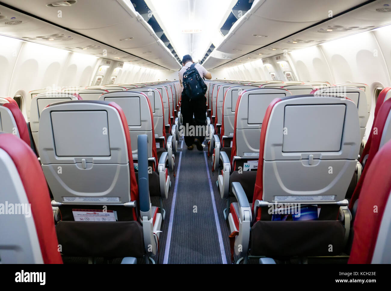 Rows of seats and aisle of a commercial airplane Stock Photo - Alamy