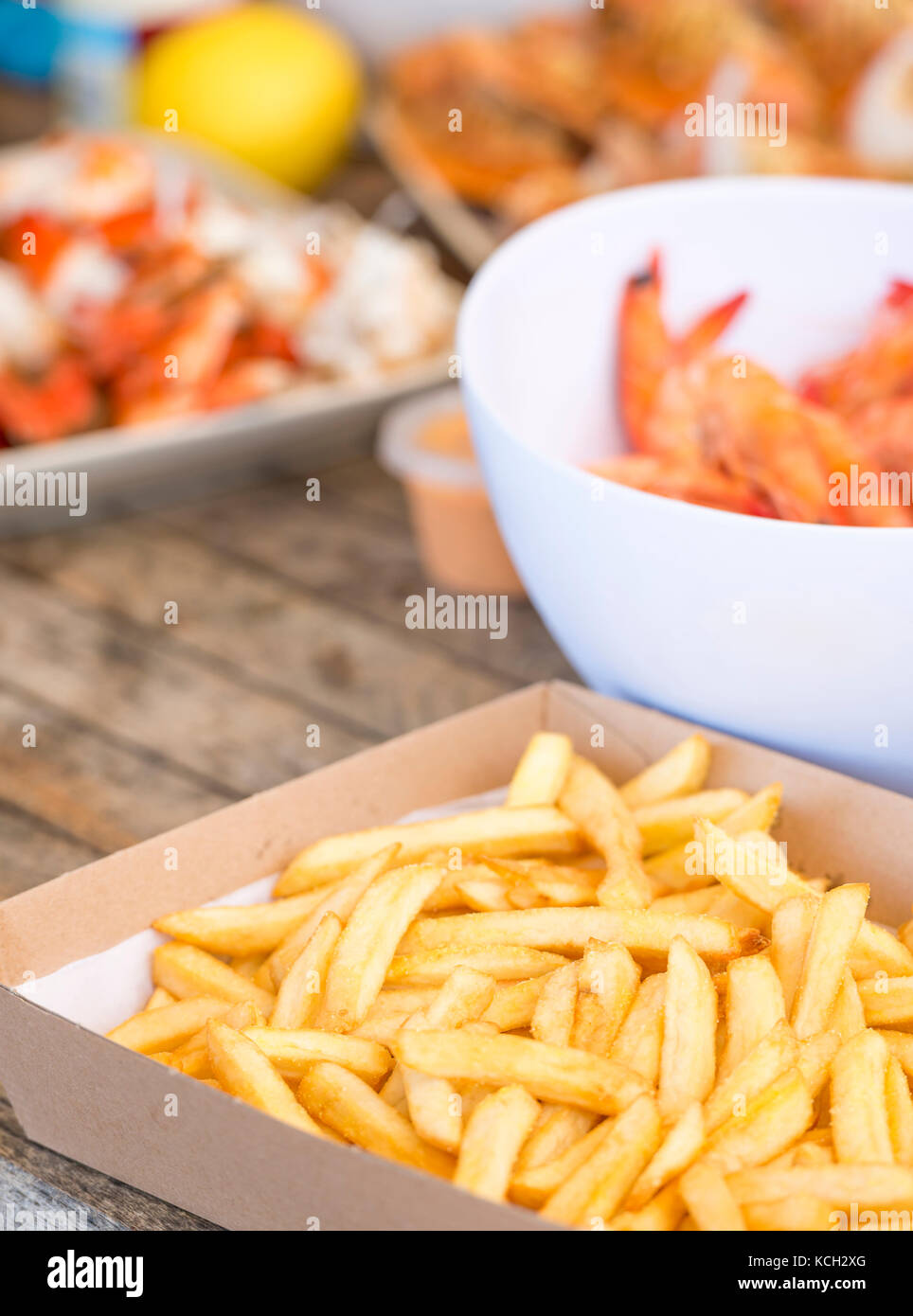 Classic Australian seafood lunch of hot chips, prawns, crab and more on