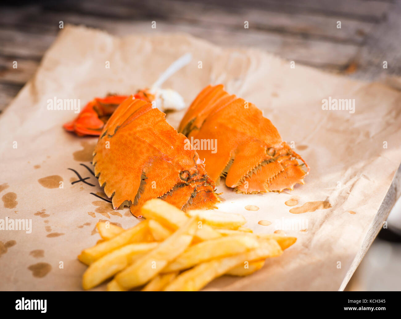 Modern take on fish and chips in Australia with Moreton Bay Bugs and hot chips Stock Photo