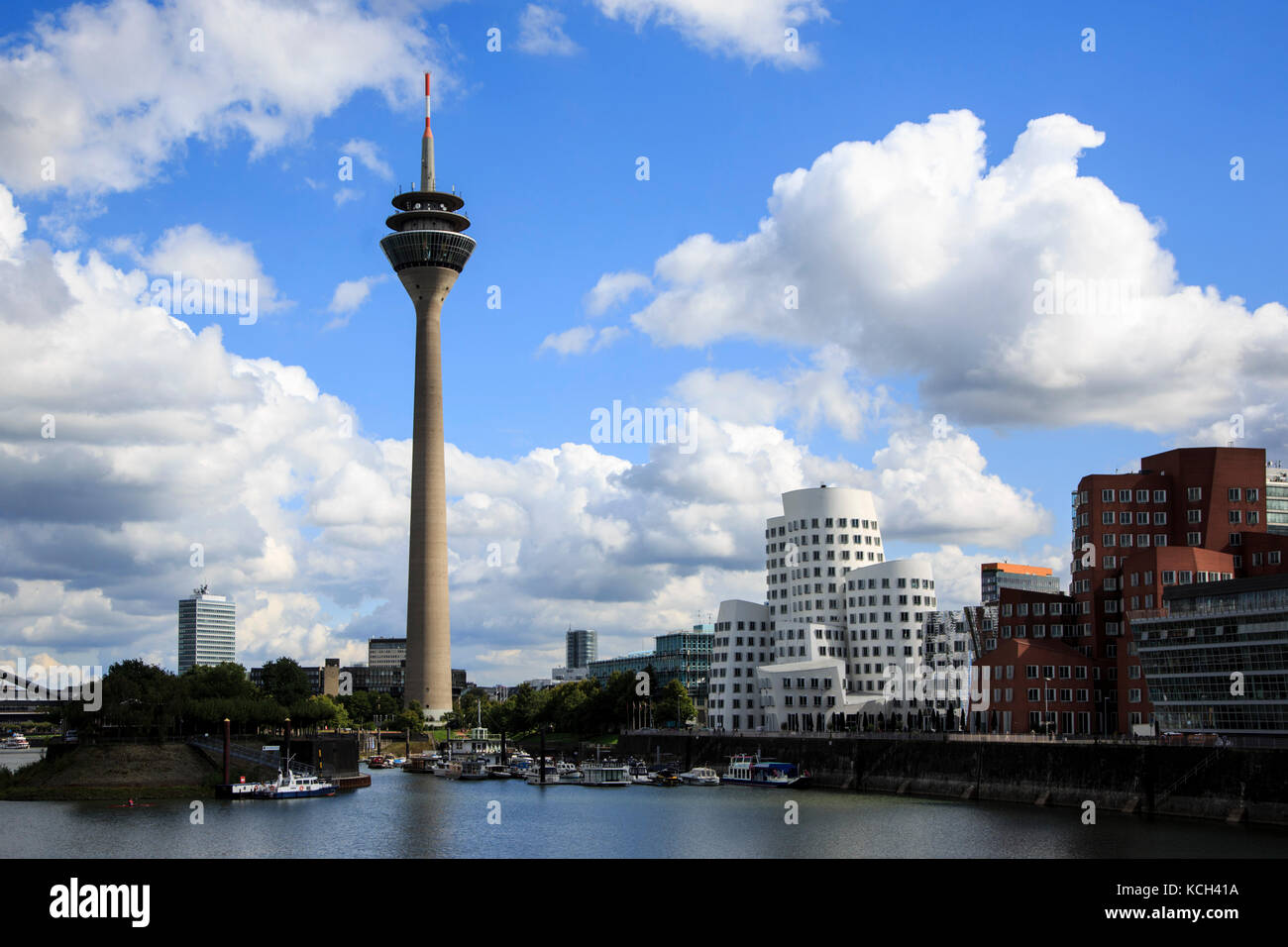 Rheinturm tower and the Gehry Building in Medienhafen, Media Harbour, Dusseldorf, Germany Stock Photo