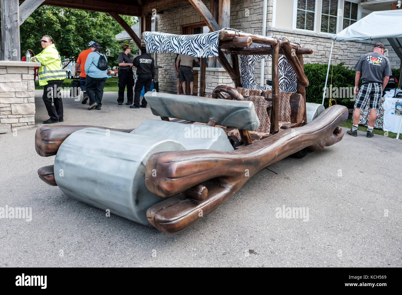 A real life replica of the Flintstones car in exhibition at Fleetwood Country Cruize-In car show, Plunkett Estate, London, Ontario, Canada Stock Photo