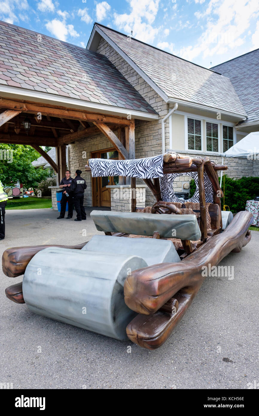 Real life replica of the Flintstones car in exhibition at Fleetwood Country Cruize-In car show, Plunkett Estate, London, Ontario, Canada Stock Photo