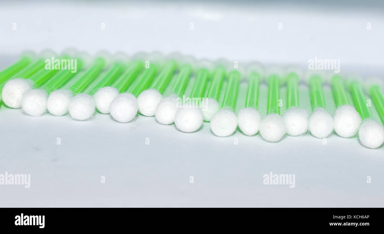 white cotton buds isolated on white background healthcare medical harm effect ear cleaning