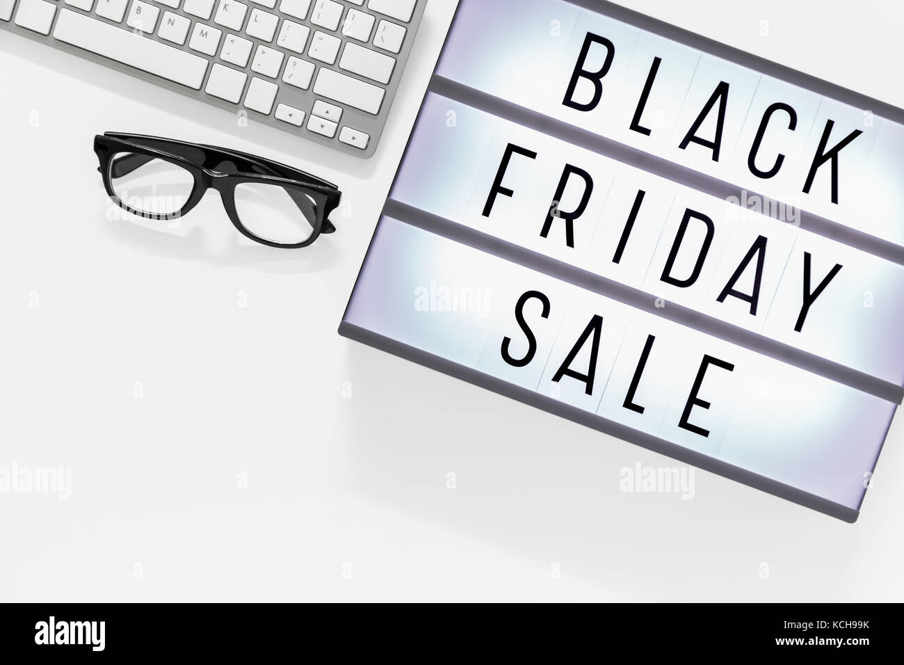 Black friday sale word on lightbox with computer keyboard Stock Photo