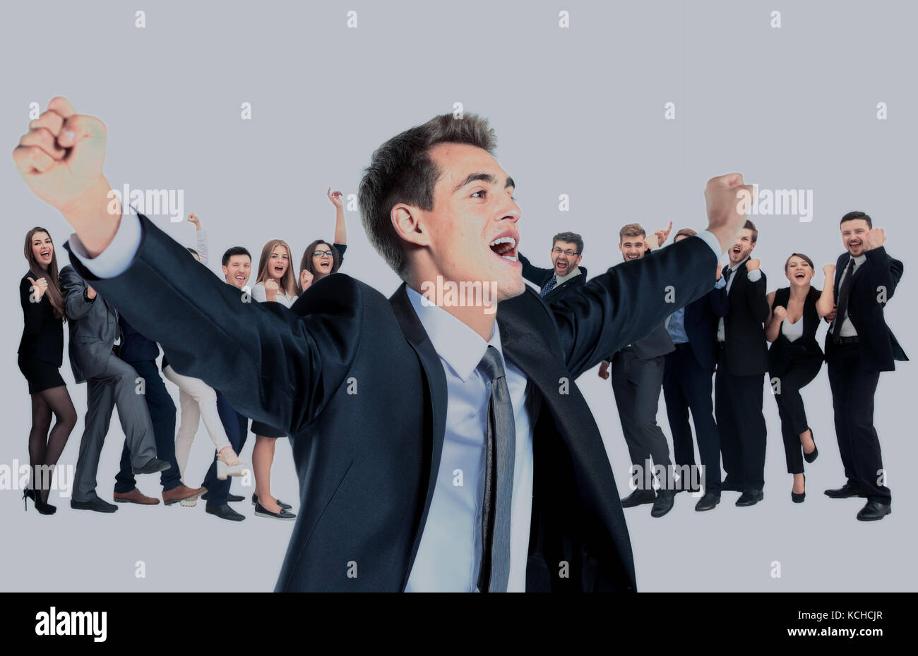 One very happy energetic businessman with his arms raised Stock Photo ...