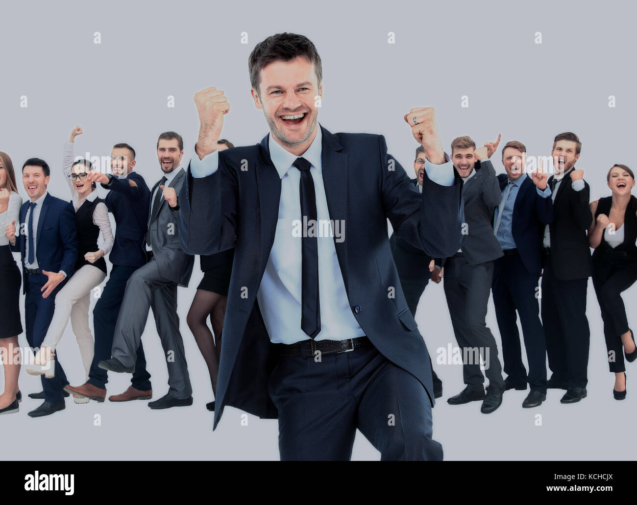 One very happy energetic businessman with his arms raised Stock Photo ...