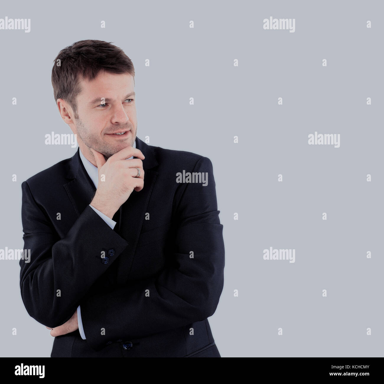 Confident and thoughtful business man Stock Photo - Alamy