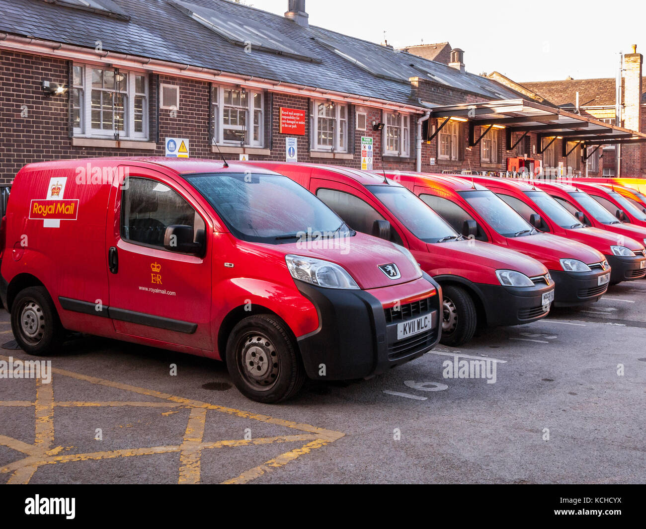 Line of Red Royal Mail Vans In Depot Stock Photo - Alamy