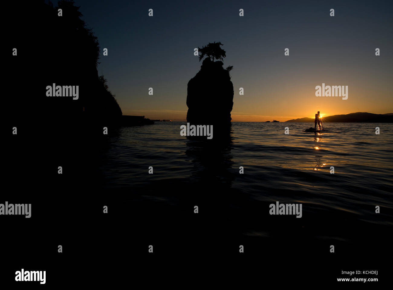 Stand Up Paddle boarding (SUP) around Siwash Rock. Stanley Park