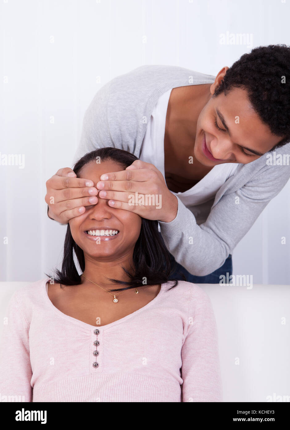 Man behind woman hi-res stock photography and images - Alamy