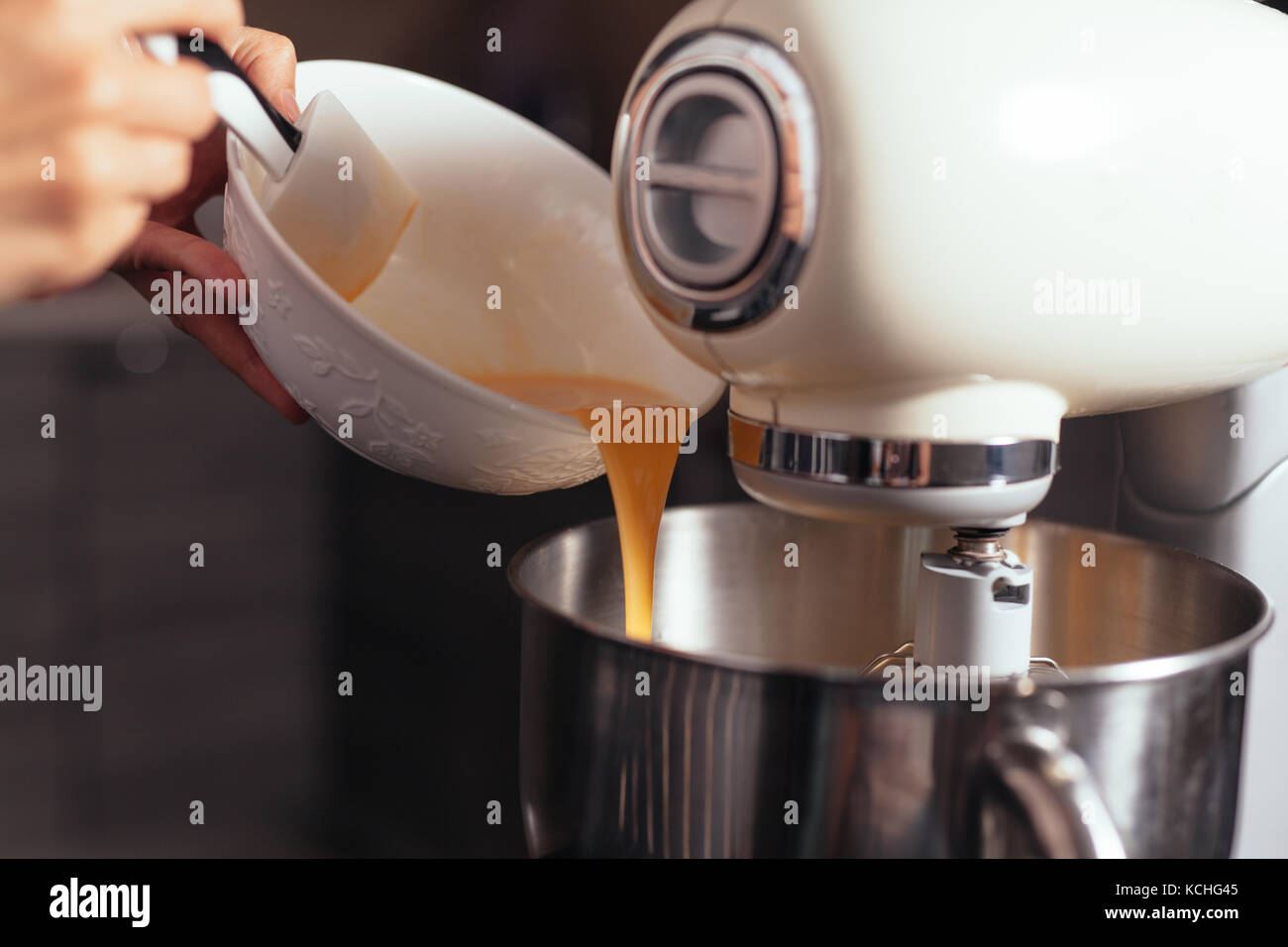 Food processor to kneading dough for bread. Manufacturing process of sweet cake Stock Photo