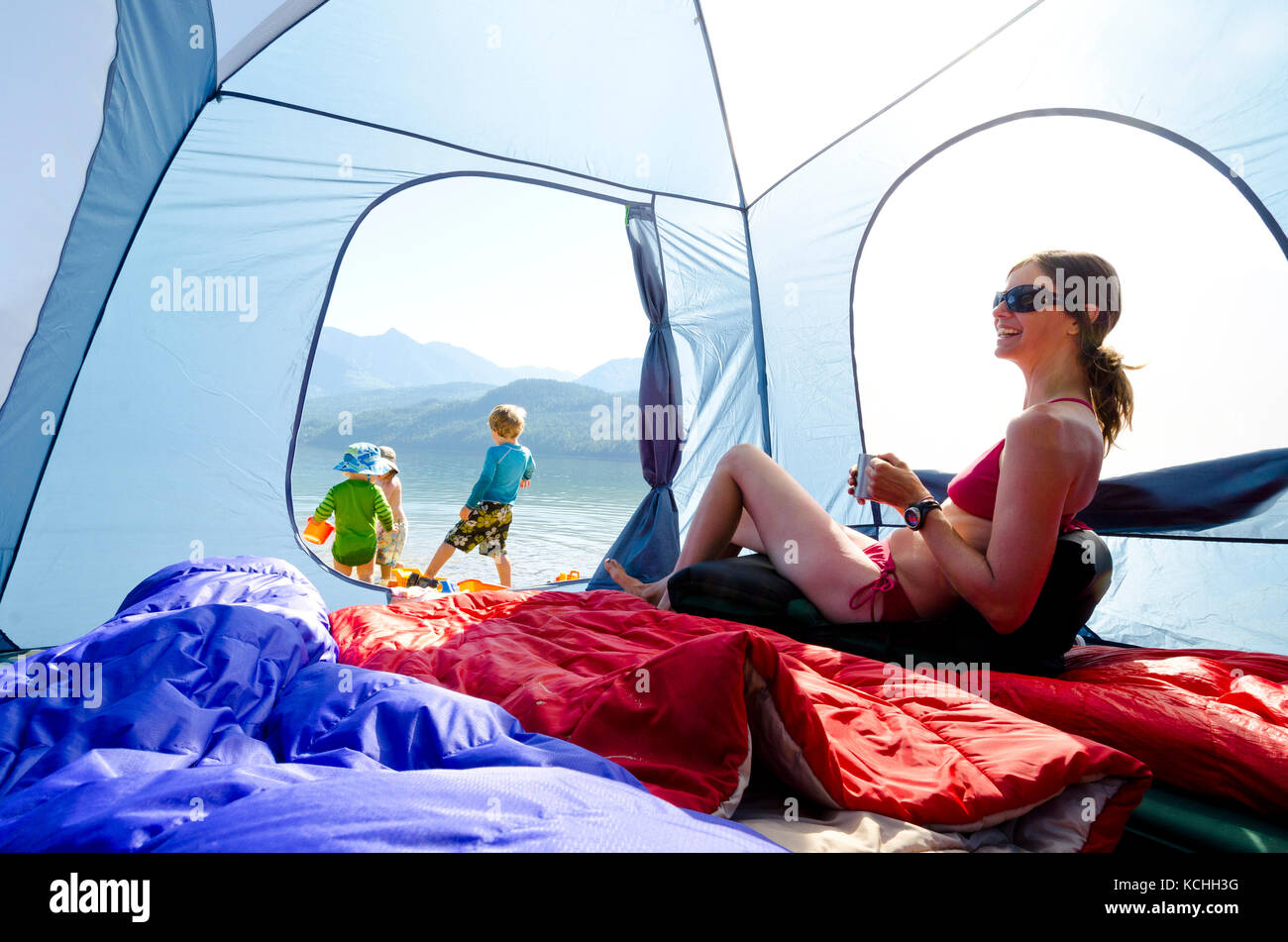 A mother, her kids and camp life on Slocan Lake, BC Stock Photo