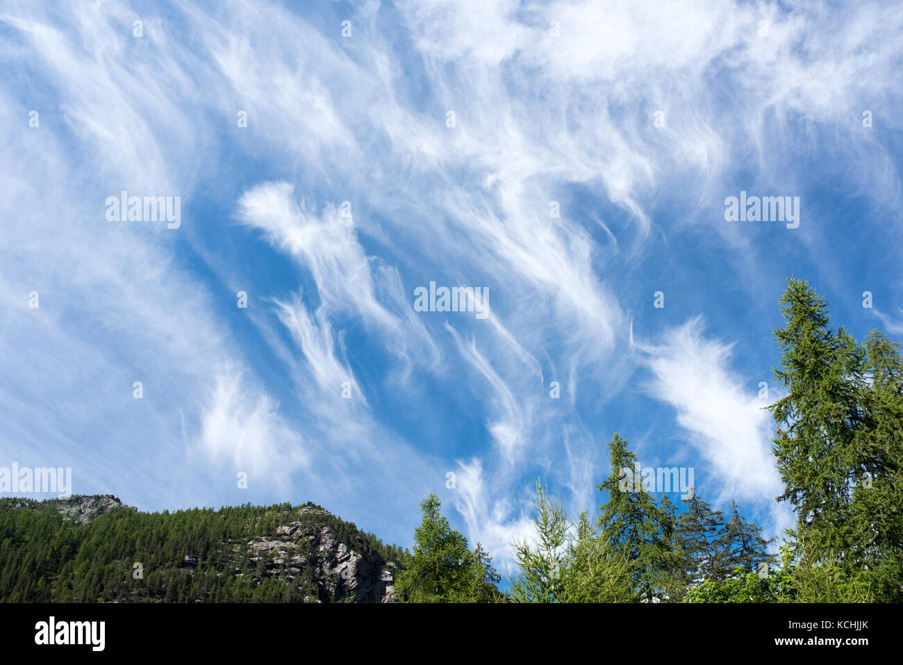 Cirrus Intortus, type of clouds in a mountains landscape Stock Photo