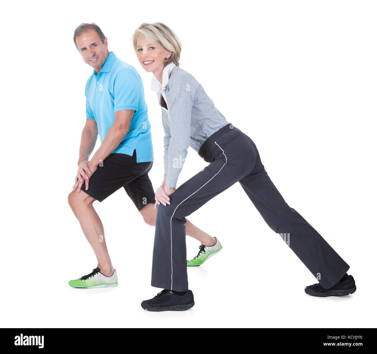 https://c8.alamy.com/comp/KCHJYN/happy-mature-couple-at-gym-in-fitness-attire-exercising-on-white-background-KCHJYN.jpg