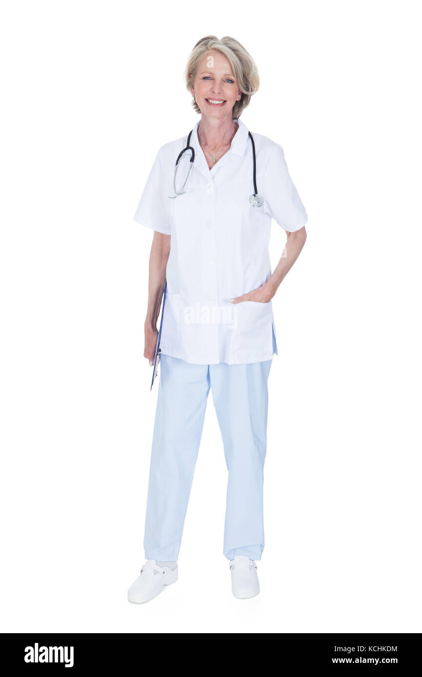Portrait Of Happy Mature Female Doctor Isolated Over White Background Stock Photo