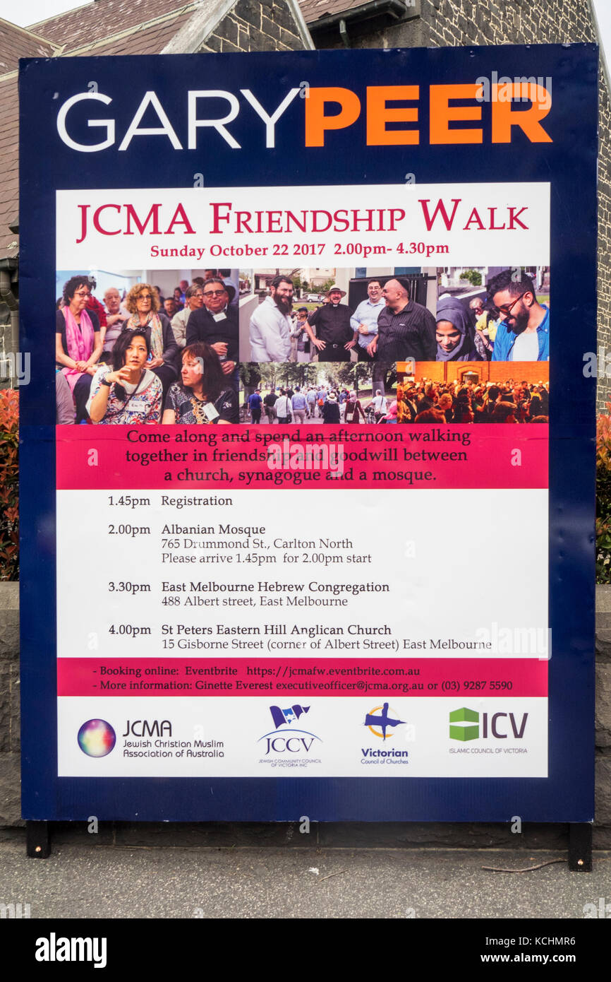 A sign advertising a friendship walk for Christians, Muslims and Jews, Melbourne Australia. Stock Photo