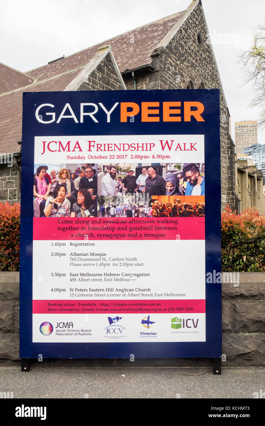 A sign advertising a friendship walk for Christians, Muslims and Jews, Melbourne Australia. Stock Photo