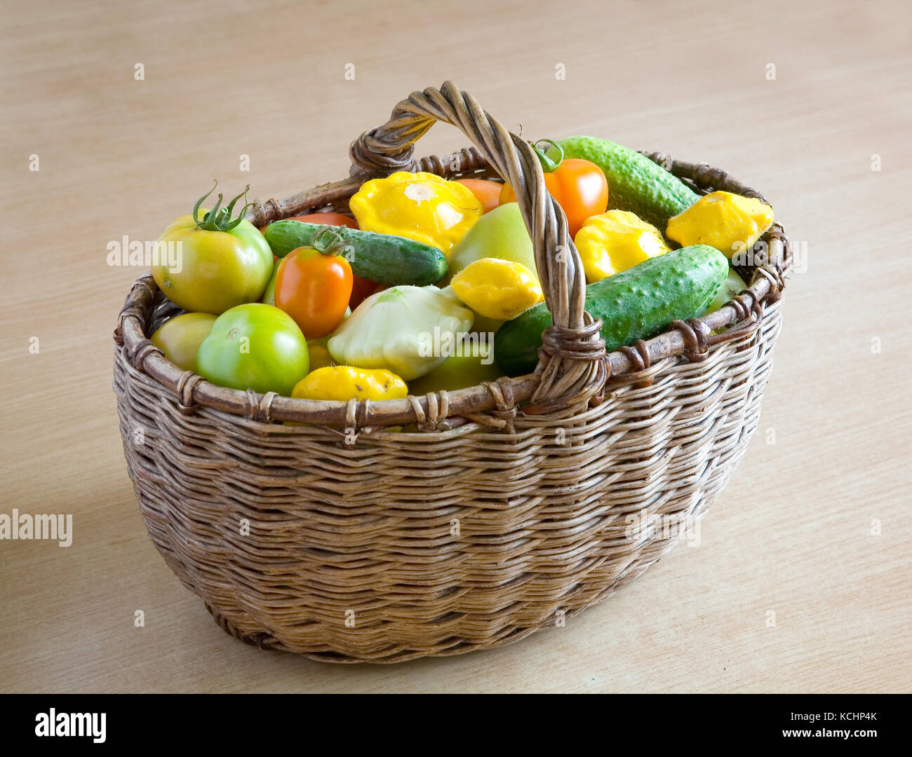 Fresh vegetables from the garden in a wicker basket. Still life Stock ...