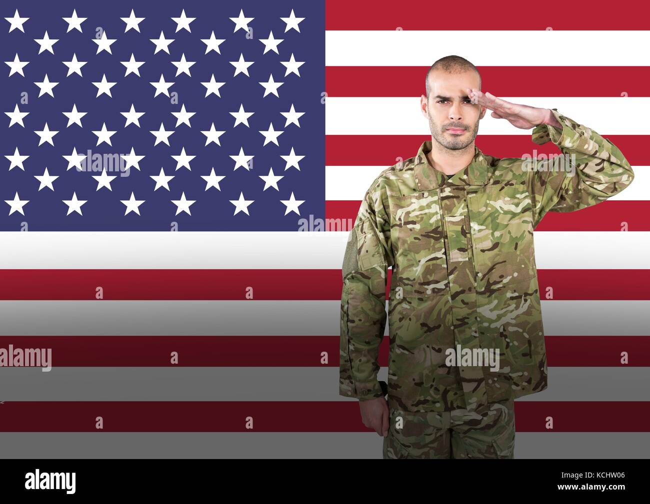 Digital composite of veterans day soldier in front of flag Stock Photo ...